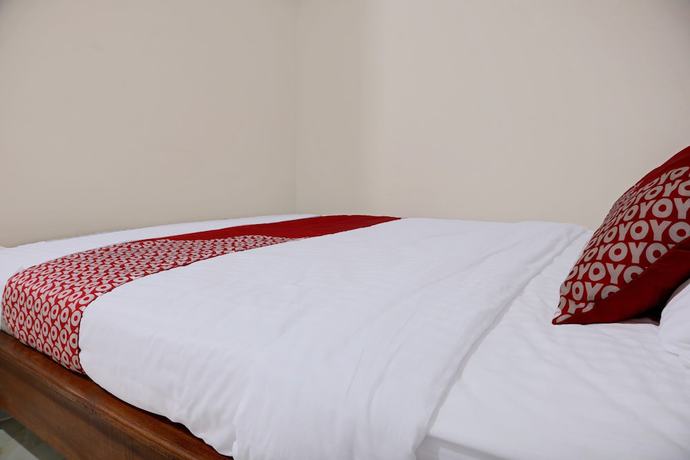Imagen de la habitación del Hotel OYO 91419 Mulia Bangka. Foto 12
