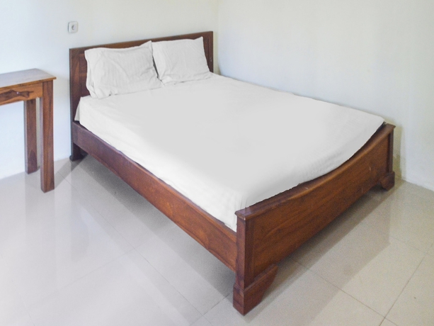 Imagen de la habitación del Hotel OYO 91424 Belfano Guest House. Foto 4