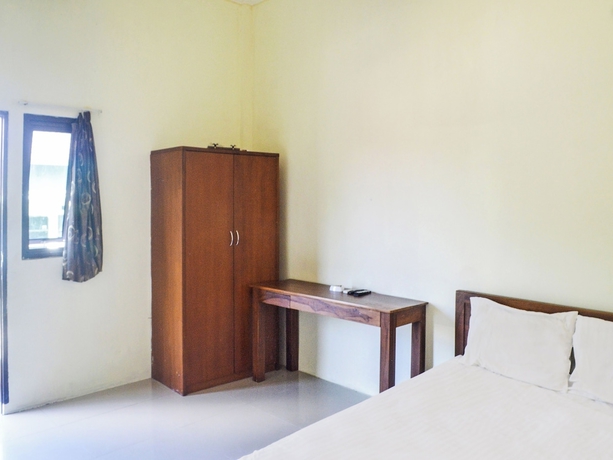 Imagen de la habitación del Hotel OYO 91424 Belfano Guest House. Foto 6