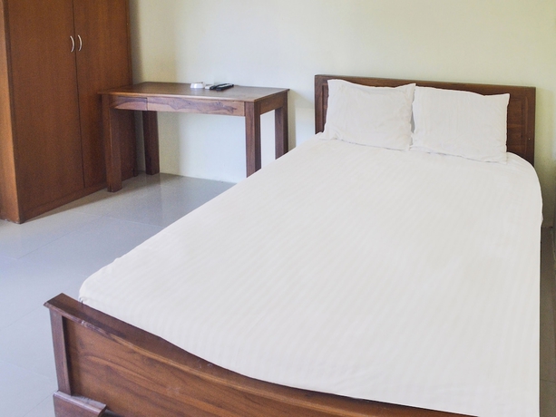 Imagen de la habitación del Hotel OYO 91424 Belfano Guest House. Foto 8