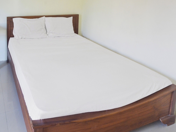 Imagen de la habitación del Hotel OYO 91424 Belfano Guest House. Foto 10