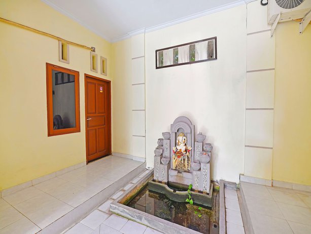 Imagen de los interiores del Hotel OYO 91445 Sandat Guest House. Foto 15