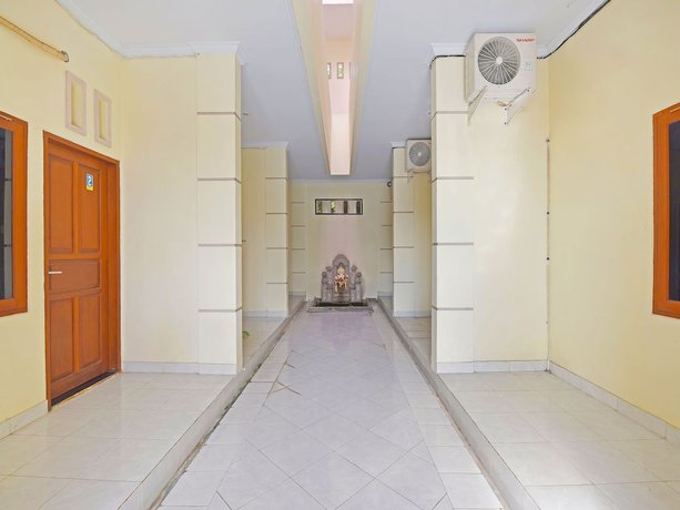 Imagen de los interiores del Hotel OYO 91445 Sandat Guest House. Foto 18