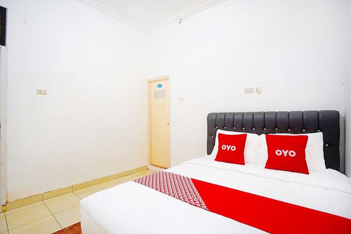 Imagen de la habitación del Hotel OYO 91460 Guest House Kencana Syariah. Foto 3