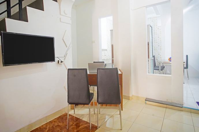 Imagen de los interiores del Hotel OYO 91460 Guest House Kencana Syariah. Foto 16