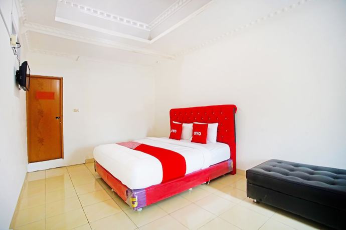 Imagen de la habitación del Hotel OYO 91460 Guest House Kencana Syariah. Foto 5