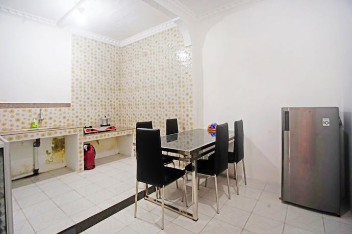 Imagen de los interiores del Hotel OYO 91460 Guest House Kencana Syariah. Foto 17