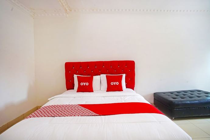 Imagen de la habitación del Hotel OYO 91460 Guest House Kencana Syariah. Foto 9