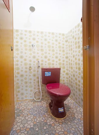 Imagen de la habitación del Hotel OYO 91460 Guest House Kencana Syariah. Foto 10