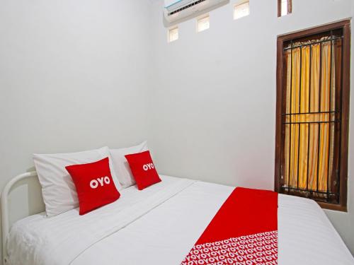 Imagen de la habitación del Hotel OYO 91487 Ib Homestay Syariah. Foto 18