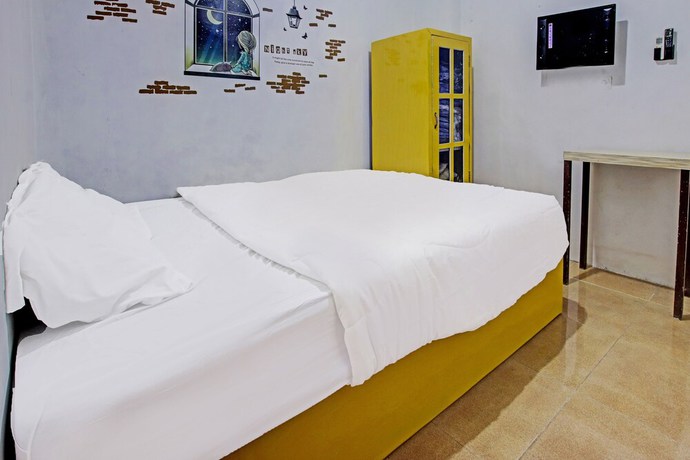 Imagen de la habitación del Hotel OYO 91506 Kedai Cinta Guest House. Foto 3