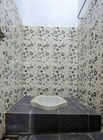 Imagen de la habitación del Hotel OYO 91506 Kedai Cinta Guest House. Foto 11