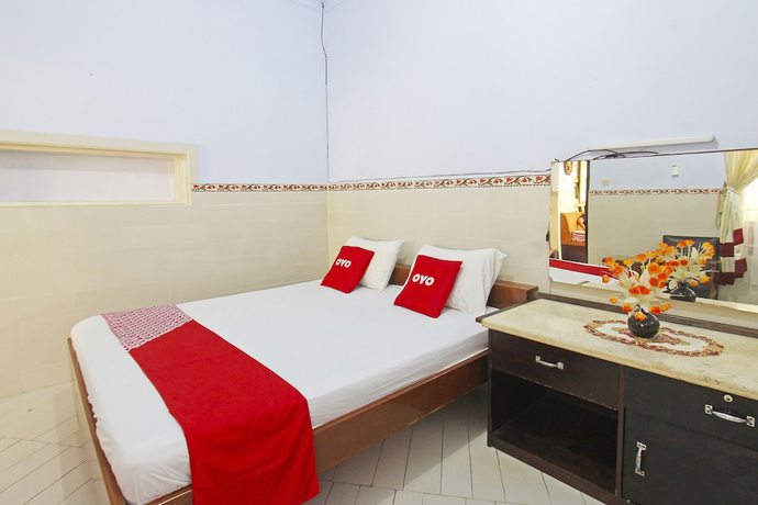 Imagen de la habitación del Hotel OYO 91516 Wisata. Foto 3