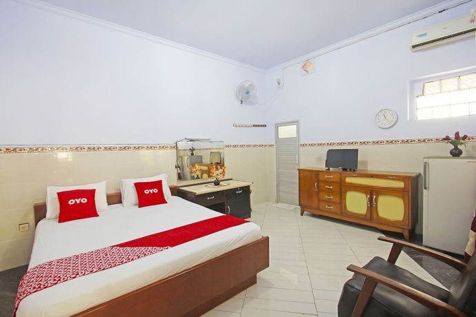 Imagen de la habitación del Hotel OYO 91516 Wisata. Foto 8