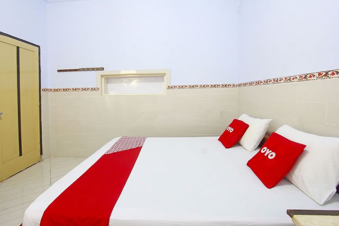 Imagen de la habitación del Hotel OYO 91516 Wisata. Foto 9