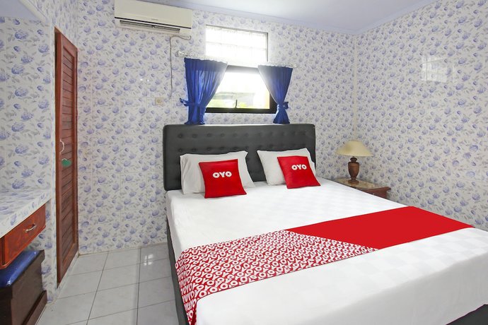 Imagen de la habitación del Hotel OYO 91516 Wisata. Foto 11