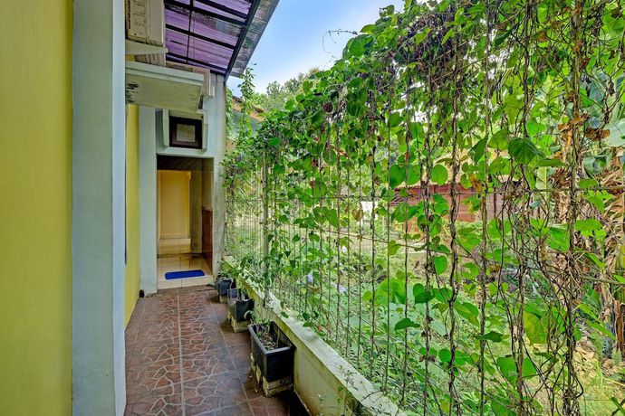 Imagen de los interiores del Hotel OYO 91522 Candi Gebang Guesthouse. Foto 14