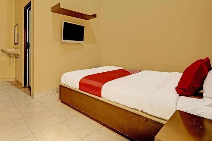 Imagen de la habitación del Hotel OYO 91522 Candi Gebang Guesthouse. Foto 9