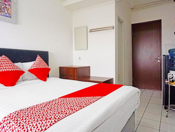 Imagen de la habitación del Hotel OYO 91593 San San Rooms Apartment Gunung Putri Square. Foto 8
