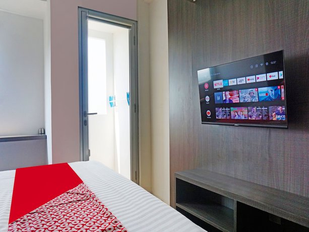 Imagen de la habitación del Hotel OYO 91593 San San Rooms Apartment Gunung Putri Square. Foto 9