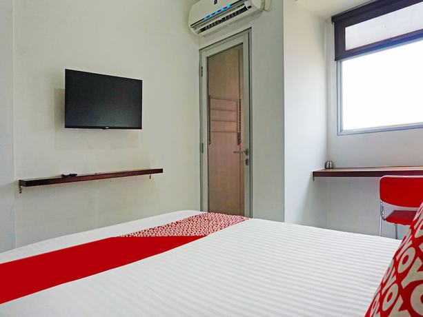 Imagen de la habitación del Hotel OYO 91593 San San Rooms Apartment Gunung Putri Square. Foto 11