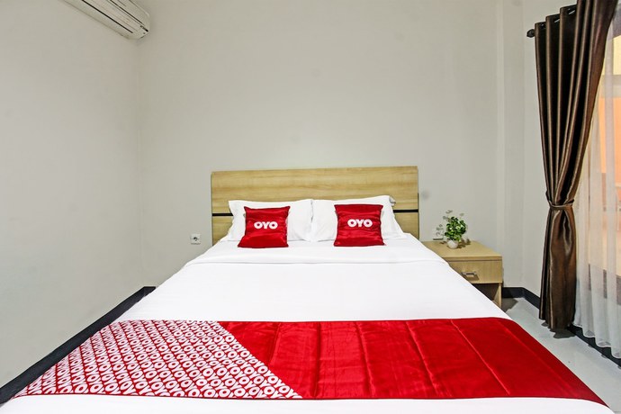 Imagen de la habitación del Hotel OYO 91617 Mutiara Lombok. Foto 5