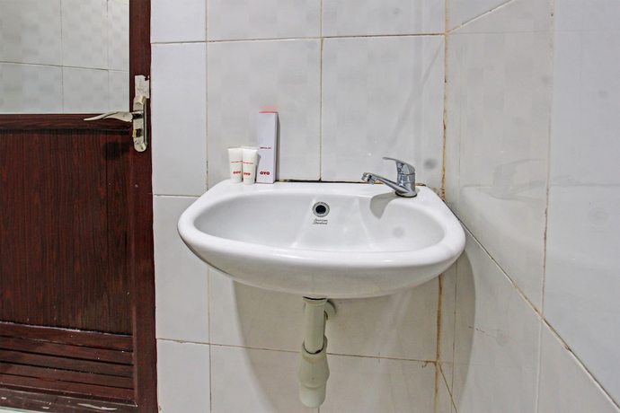 Imagen de la habitación del Hotel OYO 91617 Mutiara Lombok. Foto 11