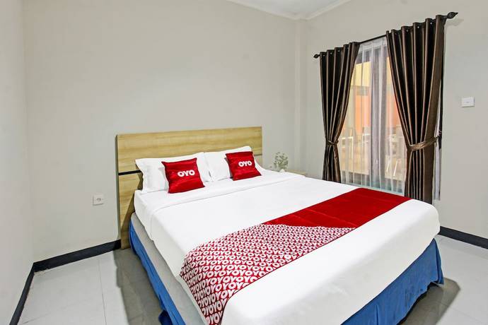 Imagen de la habitación del Hotel OYO 91617 Mutiara Lombok. Foto 12