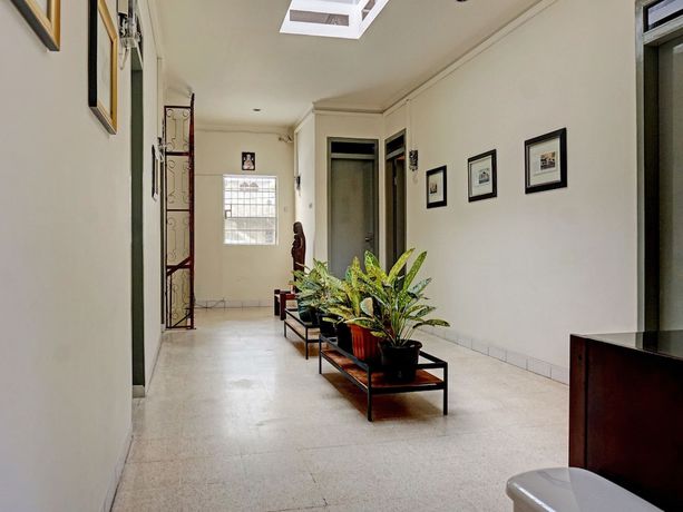Imagen de los interiores del Hotel OYO 91658 Lucis House. Foto 11