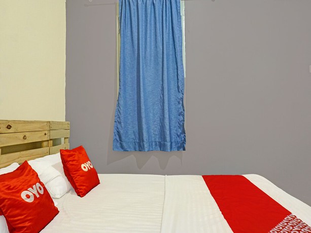 Imagen de la habitación del Hotel OYO 91658 Lucis House. Foto 3