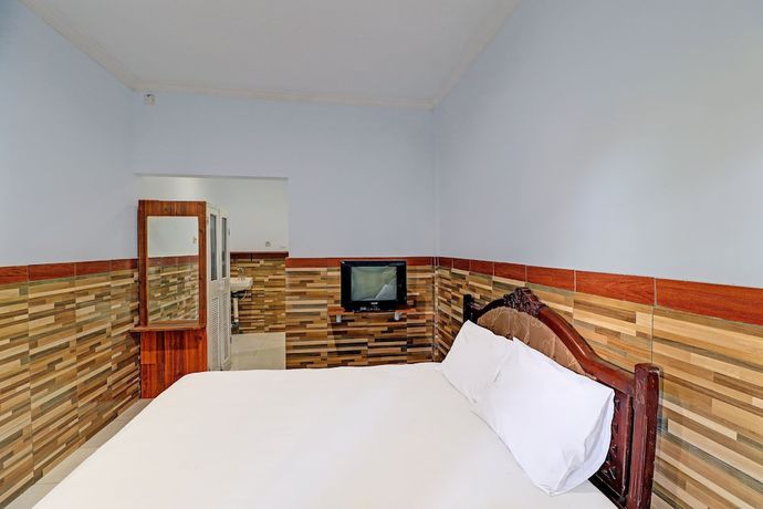 Imagen de la habitación del Hotel OYO 91678 Citarum Guest House. Foto 3