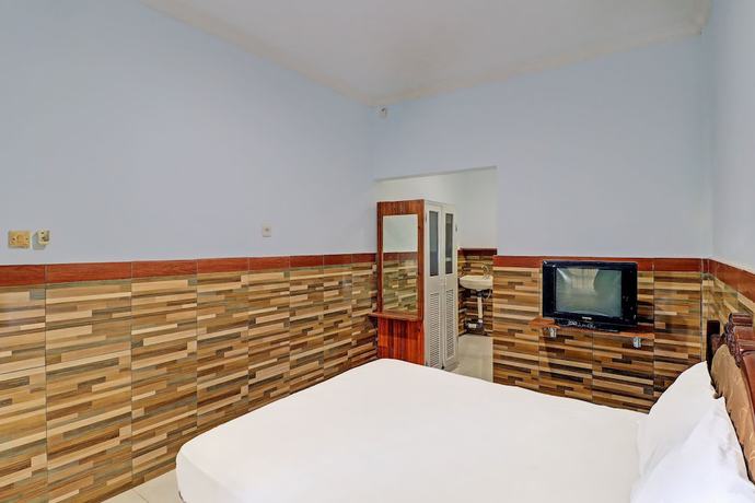Imagen de la habitación del Hotel OYO 91678 Citarum Guest House. Foto 4