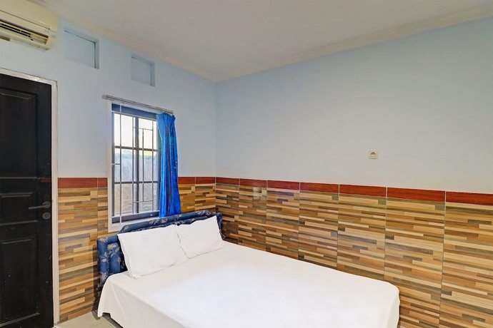 Imagen de la habitación del Hotel OYO 91678 Citarum Guest House. Foto 6