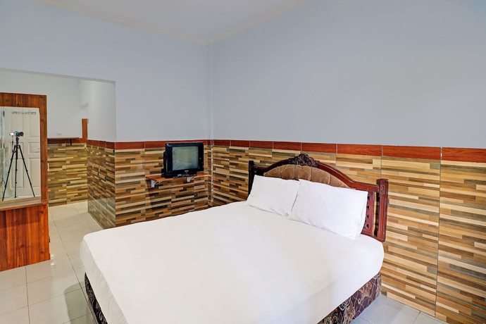 Imagen de la habitación del Hotel OYO 91678 Citarum Guest House. Foto 7