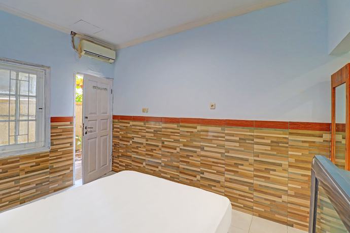 Imagen de la habitación del Hotel OYO 91678 Citarum Guest House. Foto 8