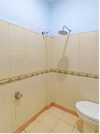Imagen de la habitación del Hotel OYO 91678 Citarum Guest House. Foto 9