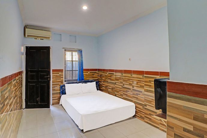 Imagen de la habitación del Hotel OYO 91678 Citarum Guest House. Foto 11