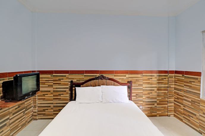 Imagen de la habitación del Hotel OYO 91678 Citarum Guest House. Foto 12