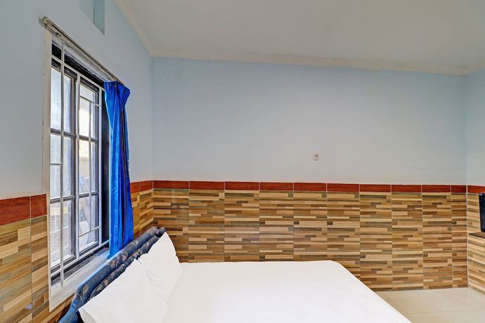Imagen de la habitación del Hotel OYO 91678 Citarum Guest House. Foto 13