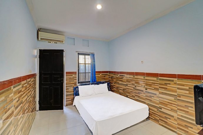 Imagen de la habitación del Hotel OYO 91678 Citarum Guest House. Foto 14