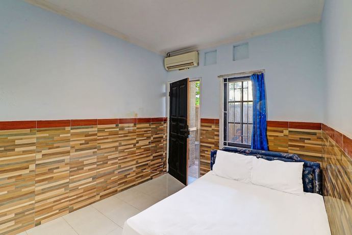 Imagen de la habitación del Hotel OYO 91678 Citarum Guest House. Foto 17
