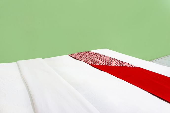 Imagen de la habitación del Hotel OYO 91683 Wijaya Kusuma Homestay. Foto 10