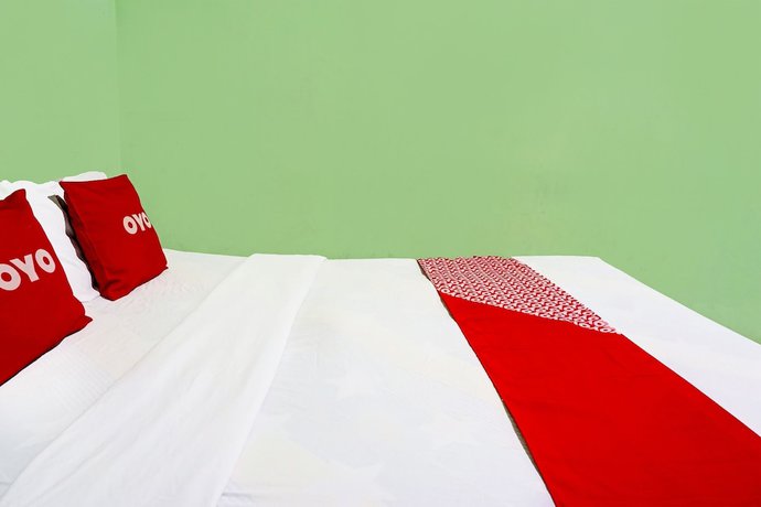 Imagen de la habitación del Hotel OYO 91683 Wijaya Kusuma Homestay. Foto 12