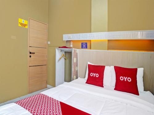 Imagen de la habitación del Hotel OYO 91689 Homestay Syariah Imah 2. Foto 19