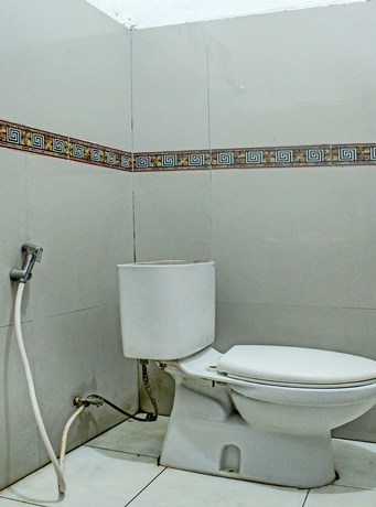 Imagen de la habitación del Hotel OYO 91720 Yotowawa. Foto 14