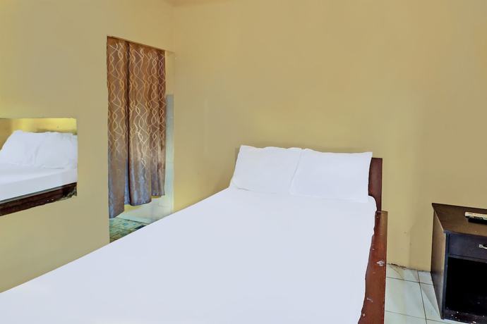 Imagen de la habitación del Hotel OYO 91724 Penginapan Pondok Asri. Foto 9