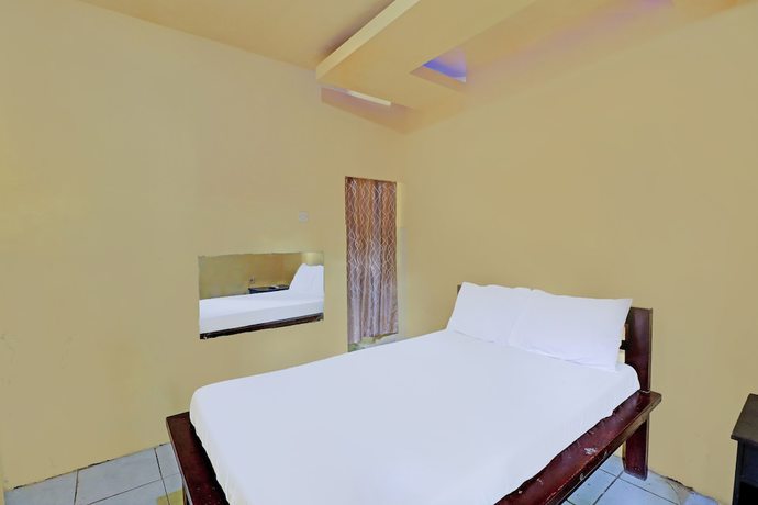 Imagen de la habitación del Hotel OYO 91724 Penginapan Pondok Asri. Foto 10