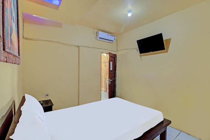Imagen de la habitación del Hotel OYO 91724 Penginapan Pondok Asri. Foto 11