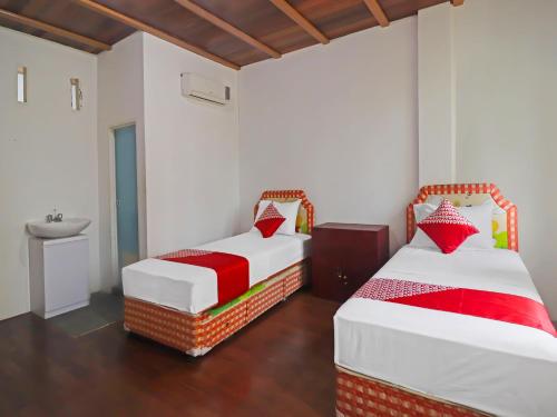 Imagen general del Hotel OYO 91807 Kemalasari Guesthouse. Foto 12