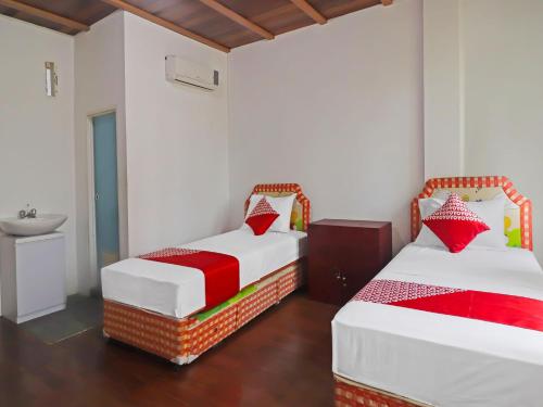 Imagen general del Hotel OYO 91807 Kemalasari Guesthouse. Foto 18